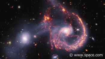 James Webb Space Telescope witnesses a 'smiling' galactic collision (images)