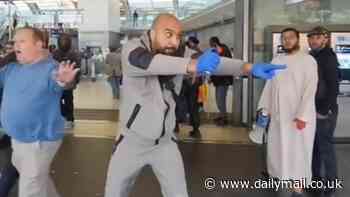 Dramatic moment plain-clothes police officer threatens commuters with pepper spray at London station