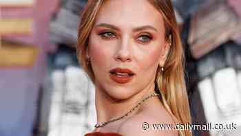 Scarlett Johansson puts on sizzling display in strapless red dress as she joins co-star Chris Hemsworth at the Transformers One London premiere