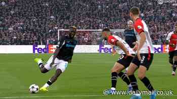 Bayer Leverkusen star Victor Boniface pulls off double nutmeg before performing 'Thierry Henry pass' to help set up goal in 4-0 win over Feyenoord