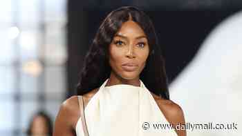 Naomi Campbell looks chic in a cream halterneck as she storms the runway with Irina Shayk at Tod's Milan Fashion Week show