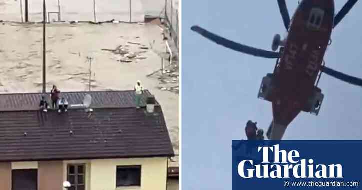 People rescued from rooftops as flooding hits northern Italy – video