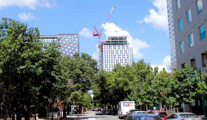 West Campus' apartment project tops out 30 stories, tallest in area