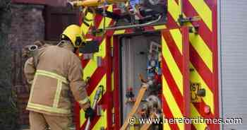 Fire crews battling flooded Herefordshire properties