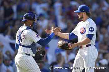 Cubs beat Nationals, stave off elimination