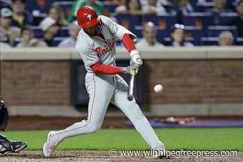 Phillies rout Mets 12-2 behind Bohm to punch playoff ticket and near NL East crown