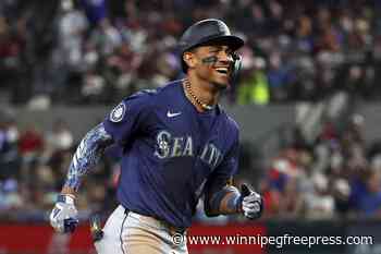 Julio Rodríguez homers twice for wild card-chasing Seattle and Kirby beats Rangers again in 8-2 win