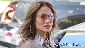 Jennifer Lopez nails casual chic in faded jeans for LA meeting - days after reuniting with Ben Affleck