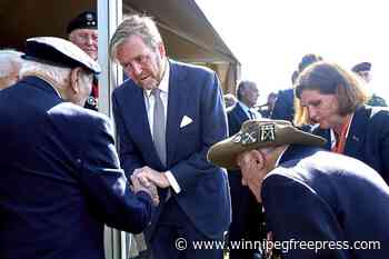 Hundreds of parachutists drop over Dutch heath to commemorate World War II operation