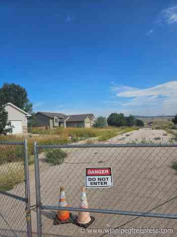 Giant sinkholes in a South Dakota neighborhood make families fear for their safety