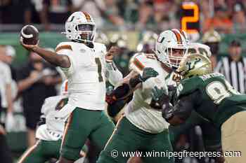 Cam Ward tops 15,000 career passing yards in No. 8 Miami’s 50-15 rout of South Florida