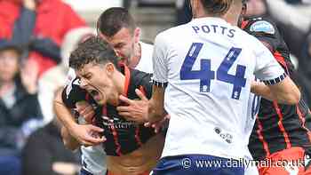 Preston forward Milutin Osmajic appears to BITE Blackburn's Owen Beck on the neck in shocking scenes in Lancashire derby