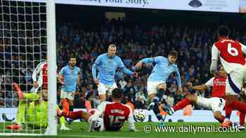 Manchester City 2-2 Arsenal: John Stones saves defending champs with last-second equaliser against 10-man Gunners