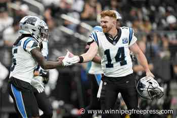 Andy Dalton passes for 319 yards and 3 TDs to lead Panthers past Raiders 36-22 for first win