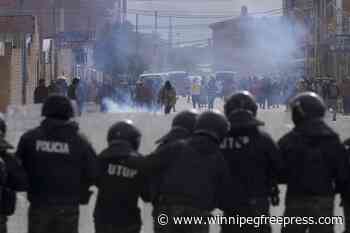 Rival protesters clash in Bolivia as ex-President Evo Morales leads a march to the capital