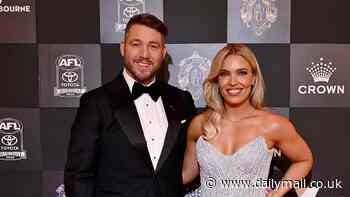 Abbey Holmes stuns in a glistening silver gown as she and Dale Thomas lead arrivals at Brownlow Medal 2024 as AFL's night of nights kicks off at Crown Melbourne