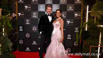 All tied up! Rebecca Judd shows off her tiny figure as she and Nathan Buckley's girlfriend Brodie Ryan lead the WAGs in corseted gown at the 2024 Brownlow Medal