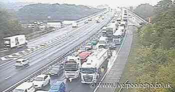 Two people taken to hospital after becoming trapped in cars after M56 crash