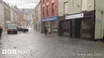 Heavy rain brings flash flooding and warning of disruption