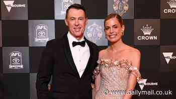 Collingwood coach Craig McRae cuts a stylish figure as he steps out with wife Gabrielle at 2024 Brownlow Medal Awards