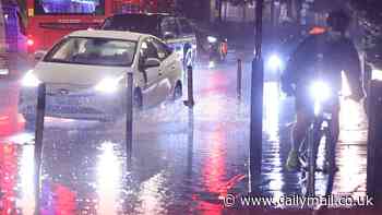 UK weather: Homes submerged and cars left under water as floods wreak havoc