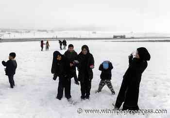 Late snowstorms batter South Africa’s coast and leave 2 people dead