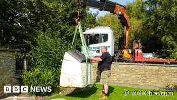 War memorial moved after locals' outrage