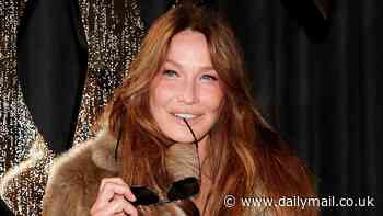 Carla Bruni, 56, turns heads in a sheer skirt as she leaves little to the imagination posing at Saint Laurent show during Paris Fashion Week