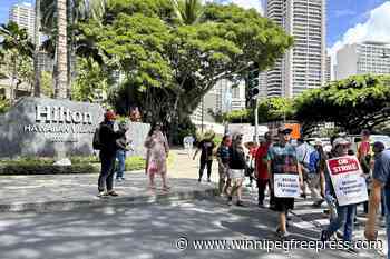 Union workers at Hawaii’s largest hotel go on strike