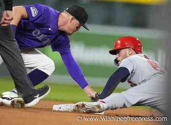 Winn homers, drives in 4 runs as Cardinals top Rockies 7-3