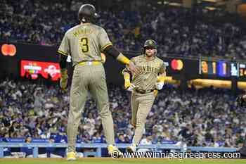 Padres turn triple play to clinch playoff spot with 4-2 win over Dodgers