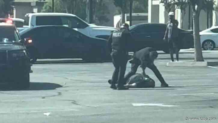 Video shows officer punching pipe-wielding suspect after fatal police shooting