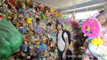 Amazing moment urban explorer finds £100,000 of abandoned toys stacked floor to ceiling in hoarder's home