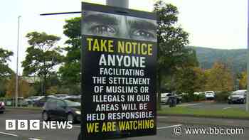 Minister requested police remove anti-immigration posters