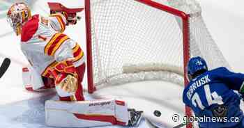 DeBrusk scores 2nd goal in OT to give Canucks pre-season win over Flames