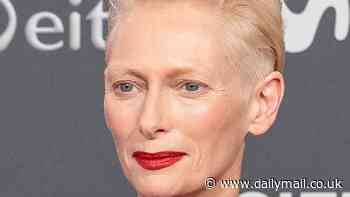 Tilda Swinton pledges her support for war-torn Gaza as she slips into an elegant black satin gown at the San Sebastian Film Festival