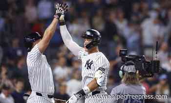 Yankees win AL East title with 10-1 victory over Orioles behind Judge, Stanton and Cole