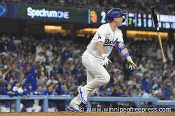 Dodgers rally with 5 runs in 7th and beat Padres 7-2 to clinch 11th NL West title in 12 years