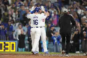 Dodgers win NL West title with a 7-2 win over Padres after 5-run rally in 7th inning