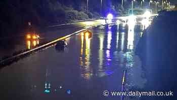 Drivers stranded on M5 after floods cause multiple closures on motorway while heavy downpours leave roads underwater across England