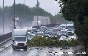 UK weather live: Travel chaos as M5 shut and 123 flood alerts issued after heavy rain