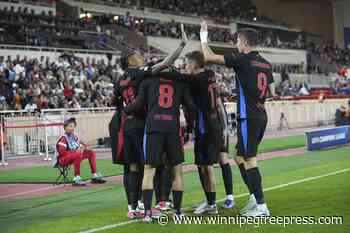 UEFA bans Barcelona fans from one away game in Champions League for Nazi-style flag