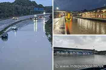 UK weather live: Travel chaos as M5 shut and 117 flood alerts issued after heavy rain