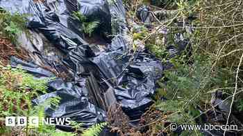 Asbestos and building waste dumped on moorland