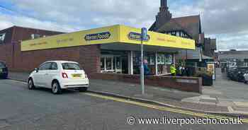 Moreton police incident live as alleyway cordoned off near Heron Foods