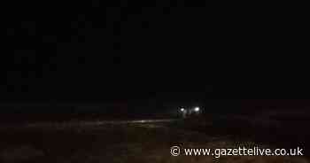 Rescue operation at Saltburn beach after passers by heard cries for help in torrential storms