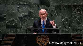 Diplomats walk out as Benjamin Netanyahu calls the UN an 'anti-Semitic swamp' in fiery speech