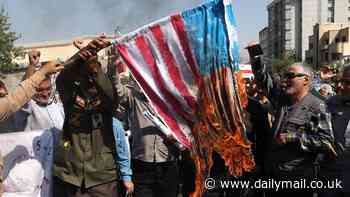 Iranians burn and trample on Israeli and US flags while calling for the Jewish state's destruction in mass pro-Hezbollah demonstrations