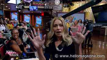 Kelly Ripa leaves her seat during Live show during lively discussion about her appearance: 'Calm down!'