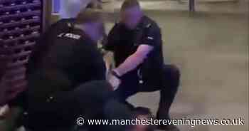 GMP issue statement after officer filmed 'punching and slapping arrested man to head'